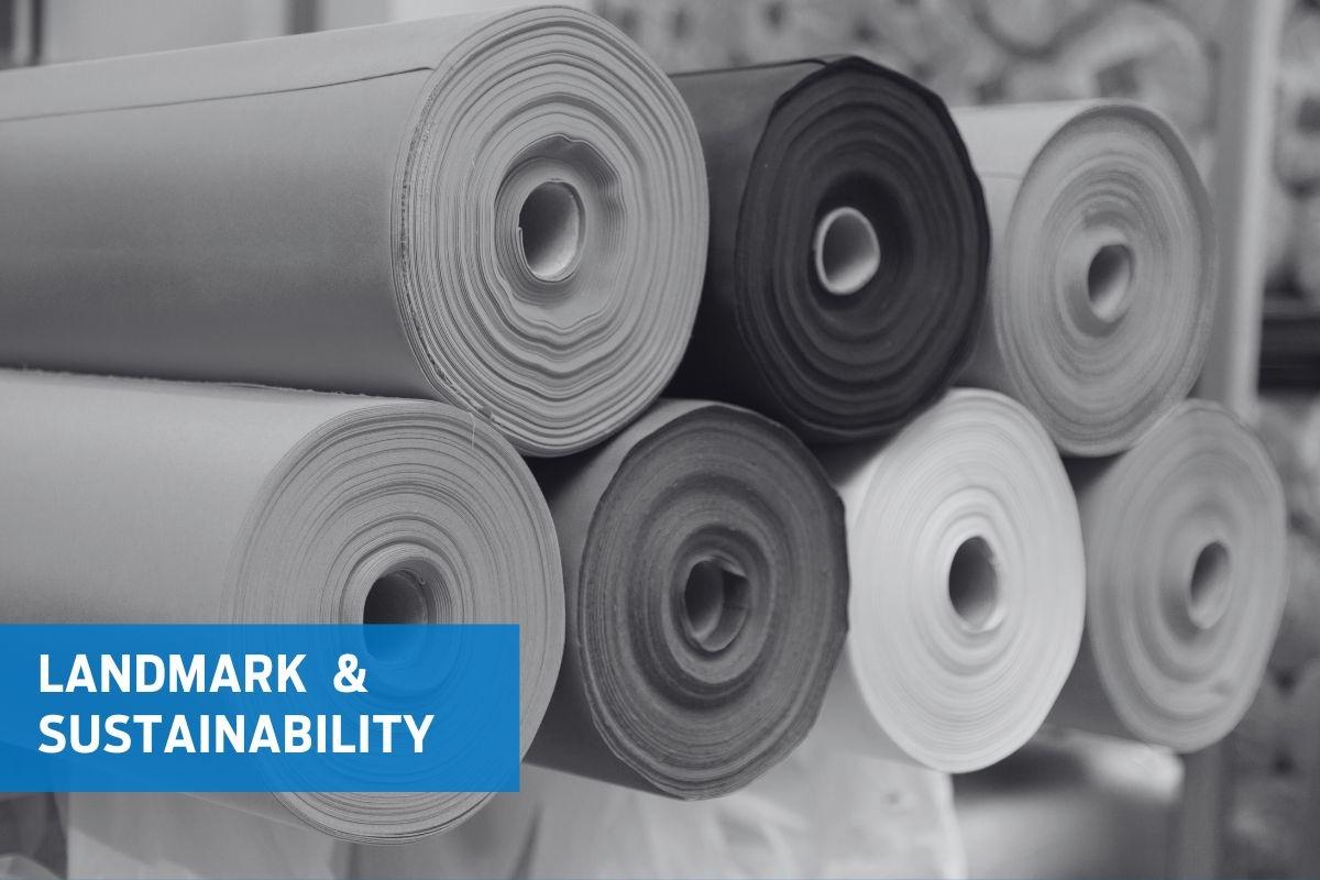 rolls of fabric with tagline landmark & sustainability