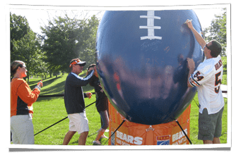 Athletes Signing TEAM Coalition's Custom Inflatable Football